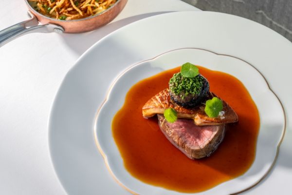 Beef tenderloin steak with duck liver, stuffed portobello, and mashed potatoes