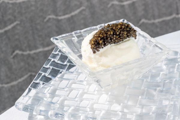 Sour cream ice cream with caviar (5 g)